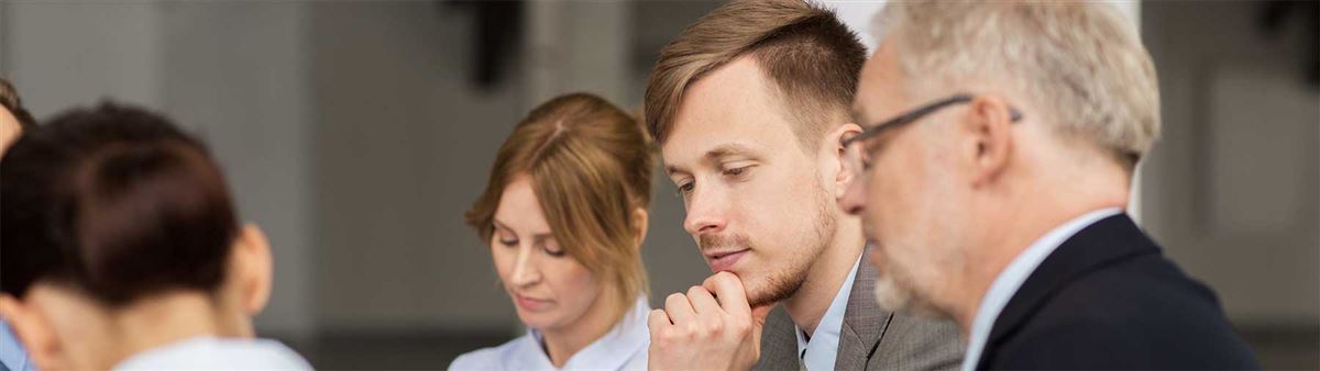 Colleagues sitting in a work meeting